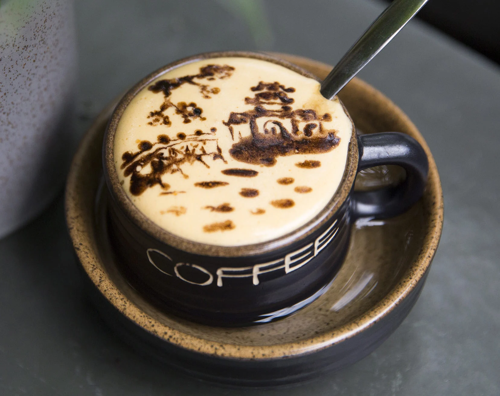 A traditional Hanoi egg coffee with latte art