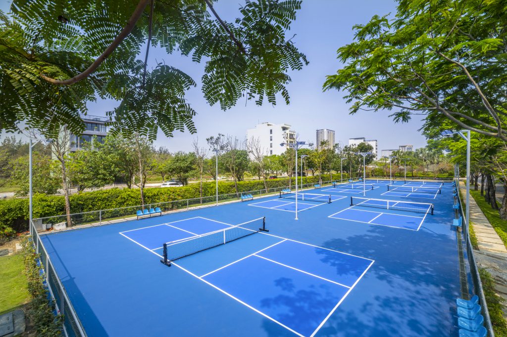 Outdoor pickleball courts in the gardens of the Furama Resort on the Da Nang beachfront