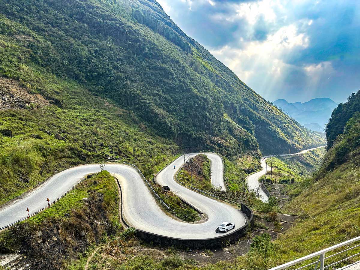 The winding mountain roads of the Ha Giang Loop in northern Vietnam, a tough multi-day motorbike trip