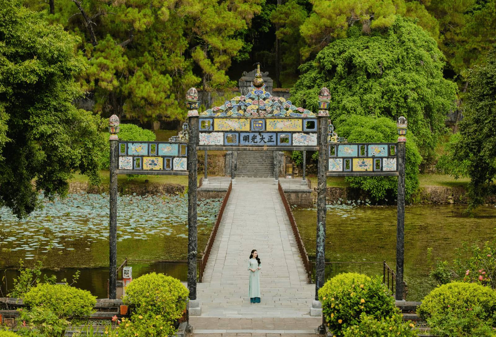 A pavilion reflected in the lake at the Minh Mang Tomb near Hue