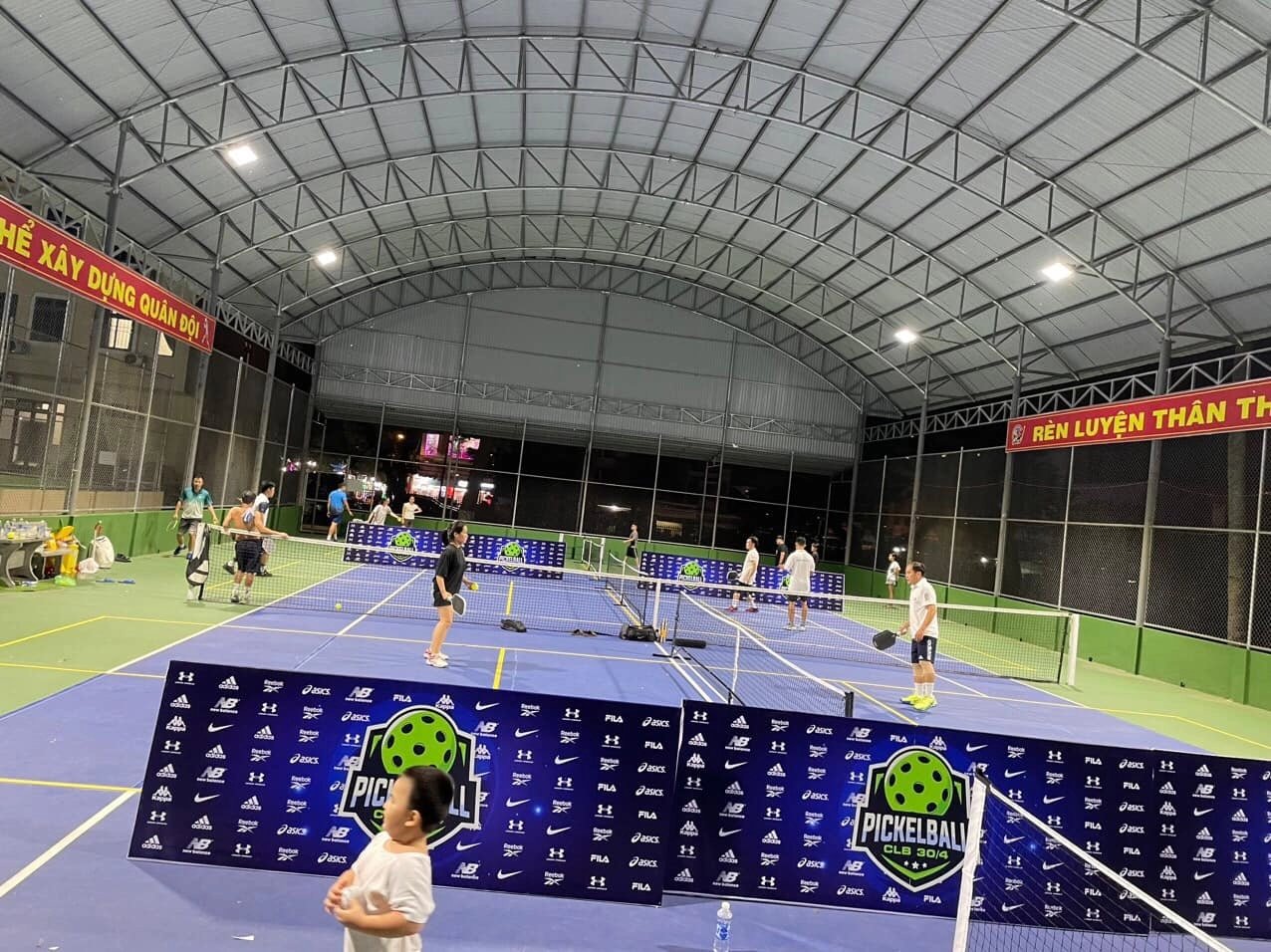 Local players on an outdoor pickleball court in Kon Tum, Central Highlands