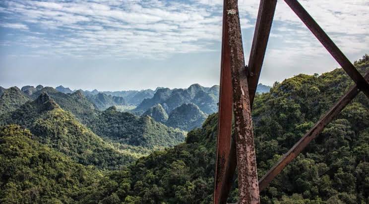 View over the forested limestone hills of Cat Ba Island from the Ngu Lam Peak lookout