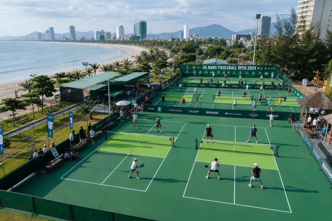 Pickleball players competing at a tournament court in Vietnam