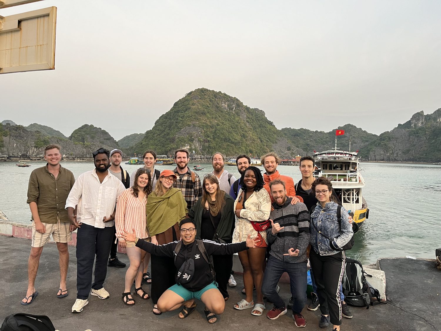 Group photo by the boats before heading out on the bay