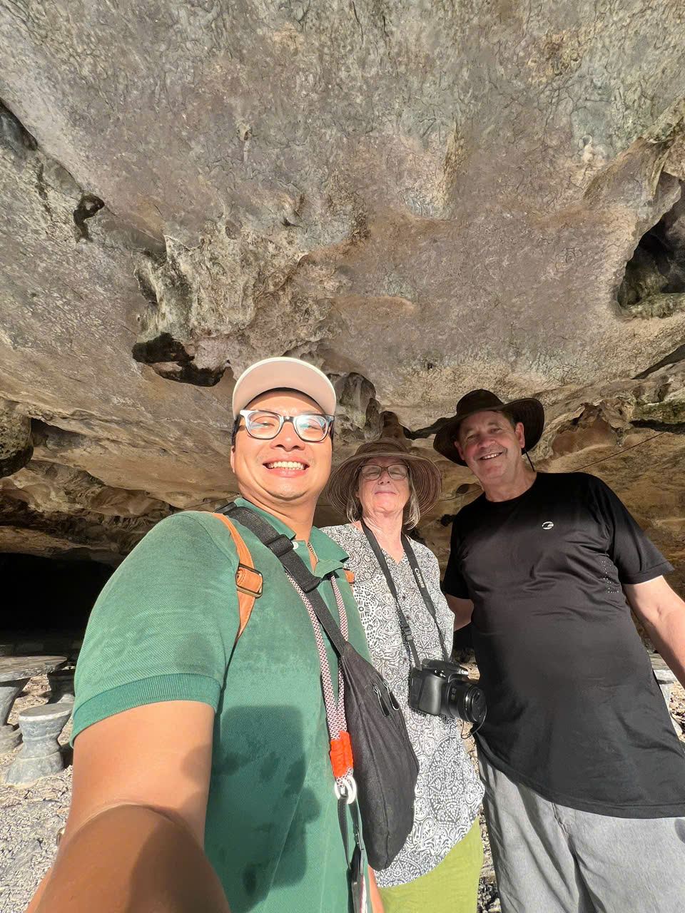 Travellers exploring a cave on a Sapa trip